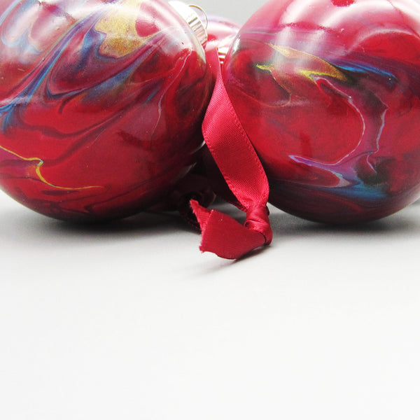 red ribbon on christmas ornament