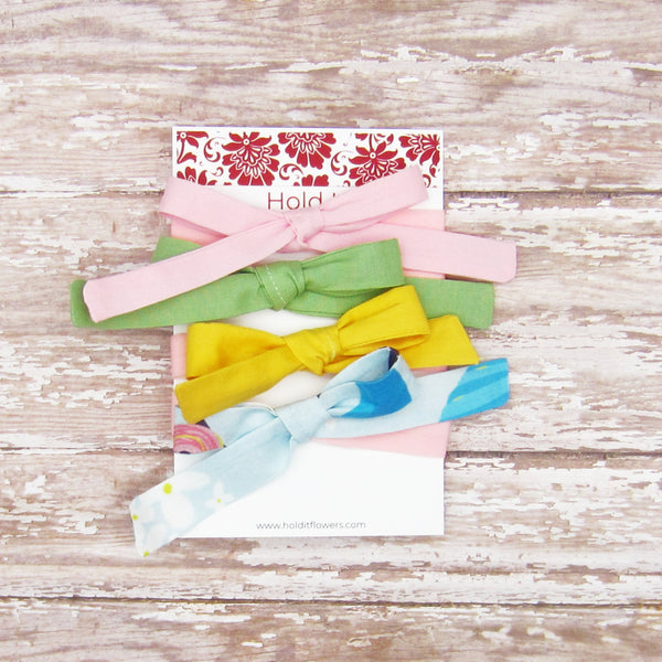 Set of 4 Fabric Bow Headbands in Pink, Green, Yellow and Blue