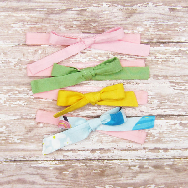 Set of 4 Fabric Bow Headbands in Pink, Green, Yellow and Blue